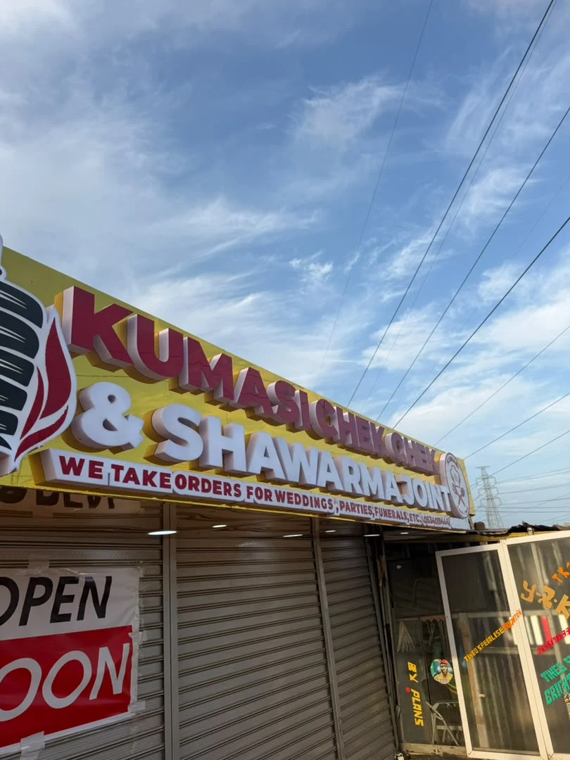 Original photograph of the restaurant’s shawarma and check-check signboard